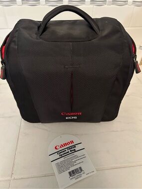 Canon Black and Red EOS Camera Travel Bag. Like new. No strap.